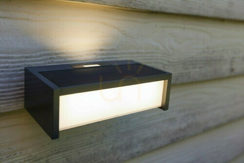 Kontrollera Lutec TELIS solcellsdriven vägglampa för utomhusbruk 11 W 3000 K mörkgrå med rörelsesensor 6929701335